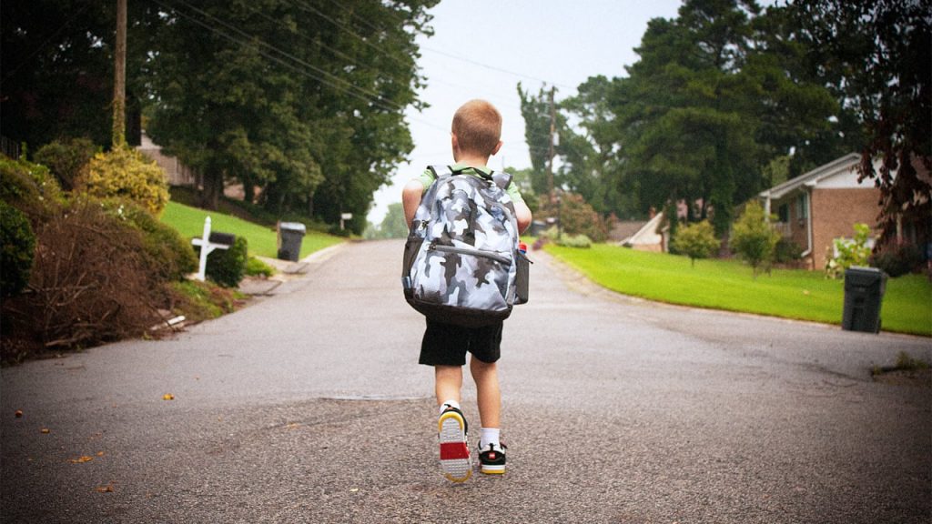 boy walking to school